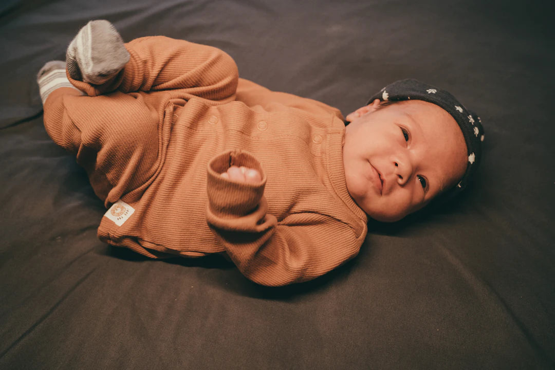 Waarom ademende stoffen essentieel zijn voor babykleding